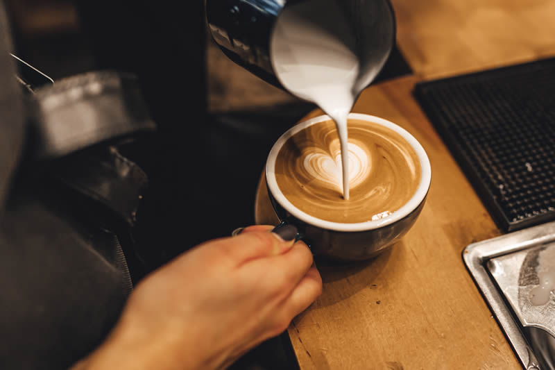 Barista Pouring Coffee